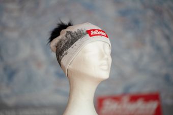 a mannequin head with a hat