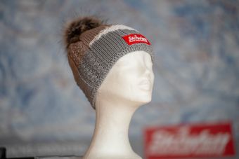 a mannequin head with a knit hat SKIWELT