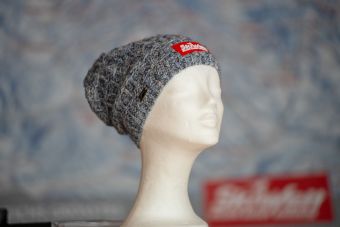 a mannequin head with a knit hat
